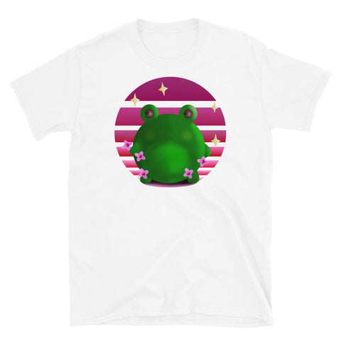 Grumpy green frog stands in front of a pink / purple vintage sunset with blossom and stars on this white cotton graphic t shirt by BillingtonPix 