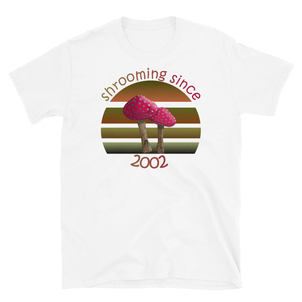 Shrooming since 2002 cute Goblincore style design with two red fly agaric mushrooms with distressed look against a multi-toned nature colour palette abstract vintage sunset design on this white cotton t-shirt by BillingtonPix