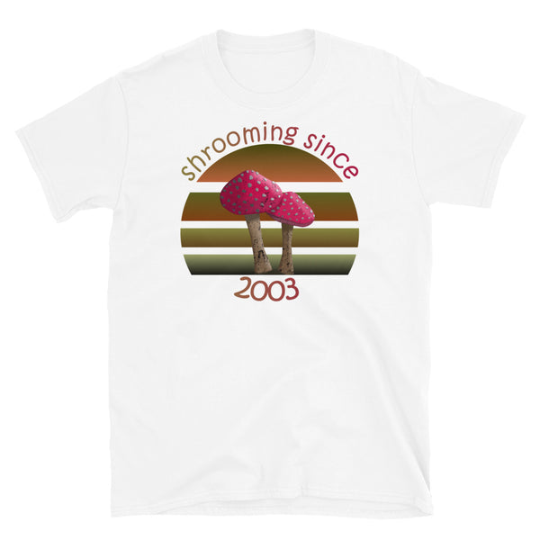 Shrooming since 2003 cute Goblincore style design with two red fly agaric mushrooms with distressed look against a multi-toned nature colour palette abstract vintage sunset design on this white cotton t-shirt by BillingtonPix