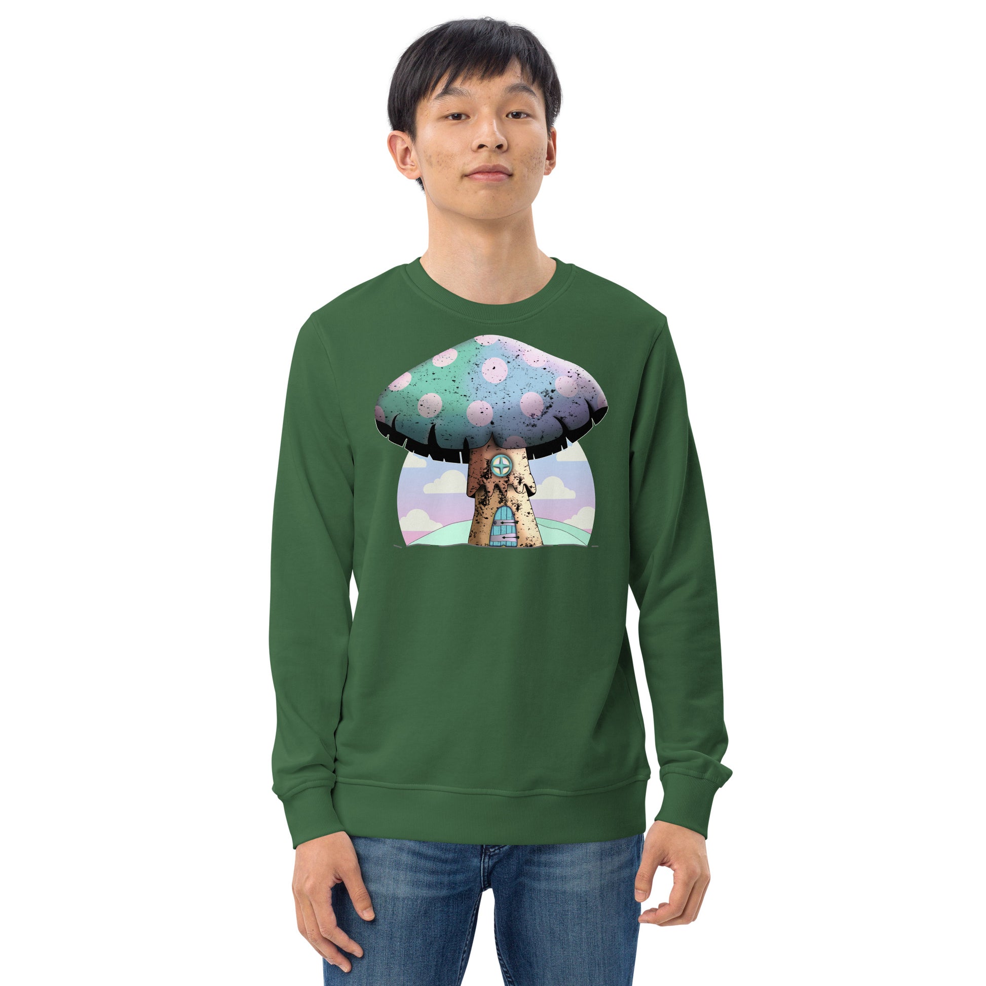 Cute mushroomcore themed organic sweatshirt with an anime mushroom house against an abstract pink cloudy sky. Mushroom house has a door and window in old wood style and the large cap of the mushroom is rainbow colored with pink spots. Very cute indeed. Graphic organic sweatshirt by BillingtonPix